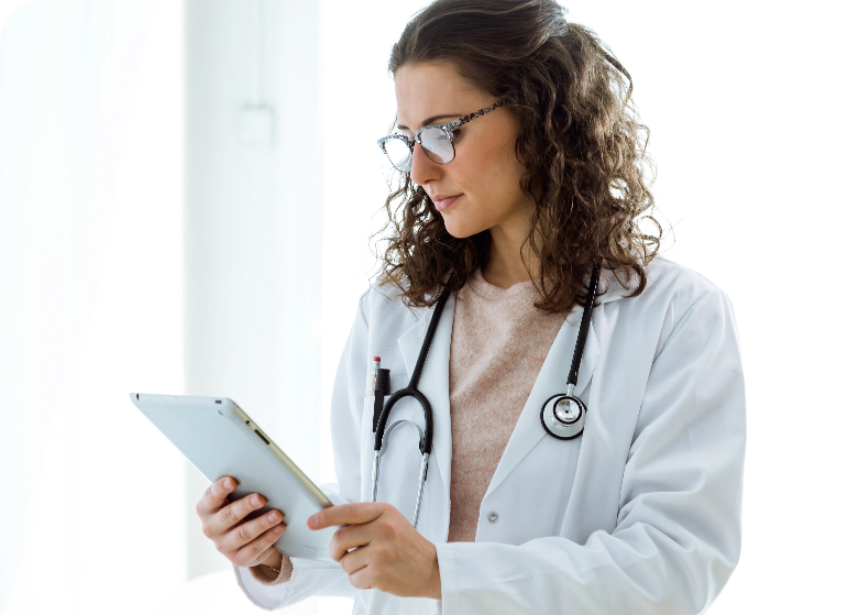 doctor looking at tablet